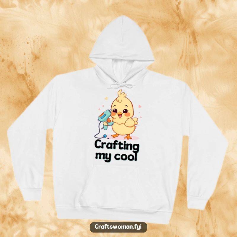 Funny crafting chick hoodie with a happy chick character using a glue gun to assemble a project, offering warmth and creative cheer.