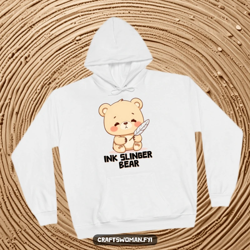 Funny bear hoodie showing a contented character writing peacefully with a feather quill, perfect for cozy creative sessions.