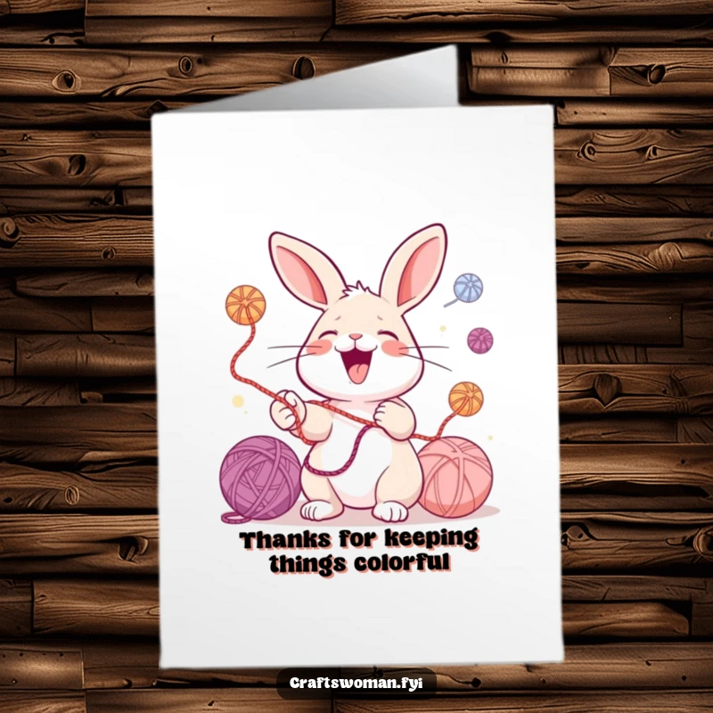Funny Free Printable Thank You Card: A laughing rabbit energetically juggles several colorful yarn balls, conveying thanks with flair.